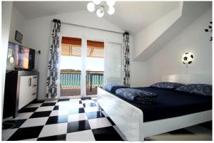 Postel nebo postele na pokoji v ubytování Villa Aurelia Vodice