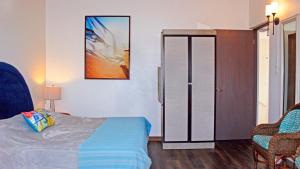 Postel nebo postele na pokoji v ubytování Blue Horizon