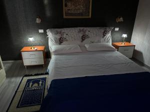 Tempat tidur dalam kamar di Pace
