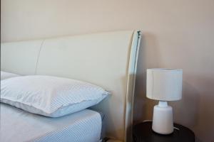Voodi või voodid majutusasutuse Home21 toas