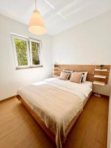 Postel nebo postele na pokoji v ubytování Apartament CroLife
