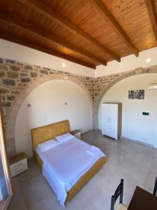Postel nebo postele na pokoji v ubytování Hotel Guri Shengjin