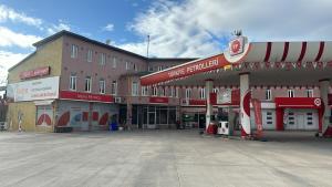 an empty parking lot in front of a building at S OTEL SİVAS in Sivas