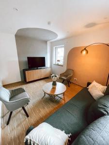 Posezení v ubytování DoreyHome P3 - Modernes charmantes Apartment