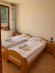 Postel nebo postele na pokoji v ubytování Vila Marko