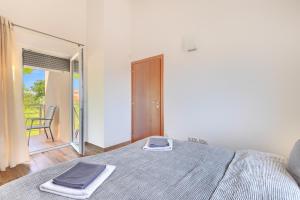 Letto o letti in una camera di Villa Lara 2