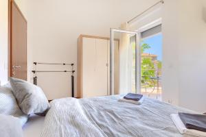 Postel nebo postele na pokoji v ubytování Villa Lara 2 + 17 fotografií