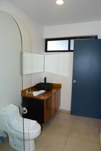 Phòng tắm tại Hotel Colinas Altavista