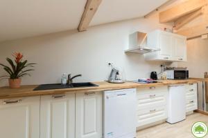 Cucina o angolo cottura di Maison d'hôtes "La Clef des Champs" Piscine Ortance