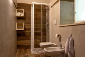 Koupelna v ubytování Agritur Maso Valli + 3 fotografie