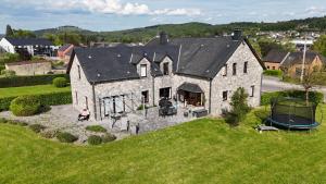 an aerial view of a large stone house at Gîte du Vieux Chemin in Durbuy
