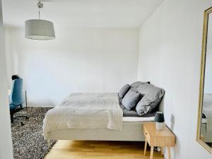 Кровать или кровати в номере Centralt Boende i Bollnäs för Affärsresenärer