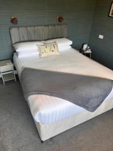 Postel nebo postele na pokoji v ubytování Braeburn Guesthouse