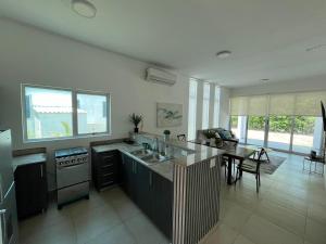 A kitchen or kitchenette at Playa Blanca Beach Rentals