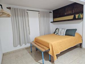 เตียงในห้องที่ Casa Tonatiuh Rioverde