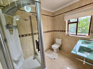 Phòng tắm tại Wellness guesthouse Casa é Connosco