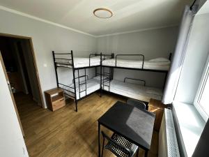 Postel nebo postele na pokoji v ubytování Dom Gościnny u Pierwienieckich