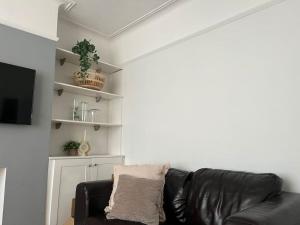 Photo de la galerie de l'établissement Cosy 3-Bedroom House 15mins to Olympic Village, à Romford