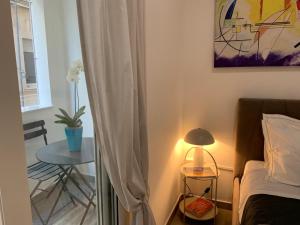 Posteľ alebo postele v izbe v ubytovaní SuitesGaribaldi