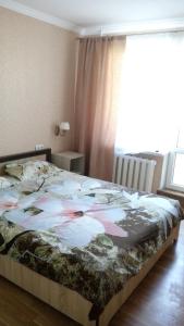 Una cama o camas en una habitación de Gogolya 4