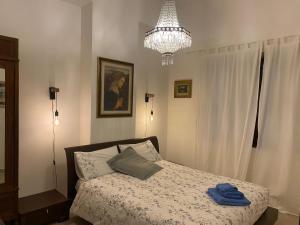 Postel nebo postele na pokoji v ubytování La Dimora di Dionisio al Mare