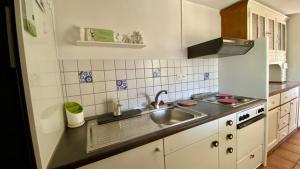 Fotografie z fotogalerie ubytování Beautiful small apartment with Lago Maggiore view v destinaci Brissago + 36 fotografií