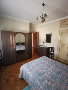 Giường trong phòng chung tại Moradia Coelho