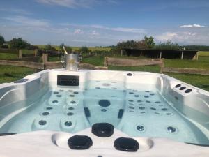 a jacuzziificialificialificialificialificialificialificialificialificialificialificial at Le Spa est dans le Pré in Triguères