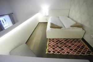 Posteľ alebo postele v izbe v ubytovaní Chain Bridge Apartment