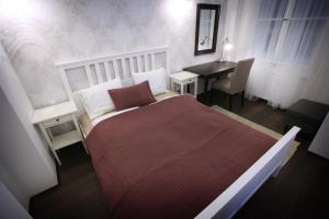 Posteľ alebo postele v izbe v ubytovaní Chain Bridge Apartment