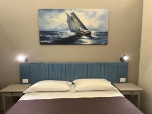 Postel nebo postele na pokoji v ubytování PescarAmare rooms