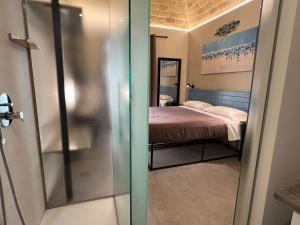 Postel nebo postele na pokoji v ubytování PescarAmare rooms
