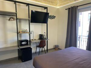 TV a/nebo společenská místnost v ubytování PescarAmare rooms