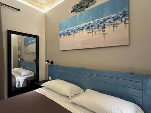 Postel nebo postele na pokoji v ubytování PescarAmare rooms