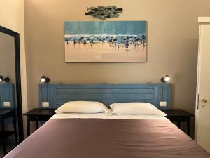 Postel nebo postele na pokoji v ubytování PescarAmare rooms