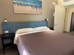 Postel nebo postele na pokoji v ubytování PescarAmare rooms