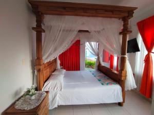 Postel nebo postele na pokoji v ubytování Finca Hotel Villa Ilusión