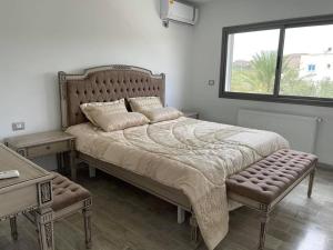En eller flere senge i et værelse på Villa Damiano Hamammet sud