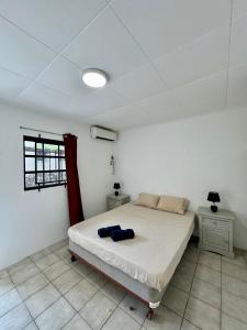 Giường trong phòng chung tại Kenepa Resort