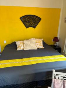 Llit o llits en una habitació de Casa Moka Amarilla