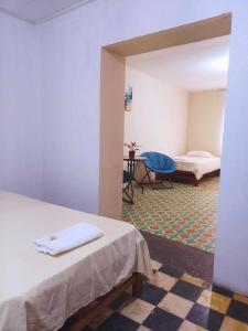 Giường trong phòng chung tại hotel Suyay Lodge Tarapoto