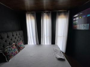Postel nebo postele na pokoji v ubytování Jarkeyda House