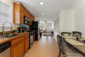 a kitchen with a sink and a stove top oven at Cozy and Quiet- Seaview Avenue in Wildwood Crest in Wildwood