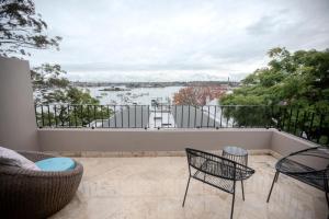 A balcony or terrace at PHOE1-3B - Harbour Haven Townhouse