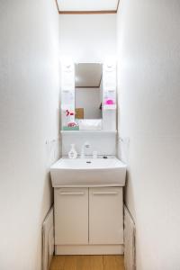 Koupelna v ubytování Hostel みんか松本 + 37 fotografií
