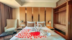 Ein Bett oder Betten in einem Zimmer der Unterkunft Swiss-Belinn Karawang