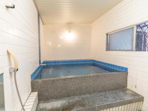 Bazén v ubytování Business Hotel Kaga nebo v jeho okolí
