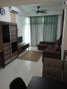 Χώρος καθιστικού στο Homestay Rumahrakan Meru Ipoh