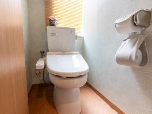 Koupelna v ubytování Business Hotel Kaga