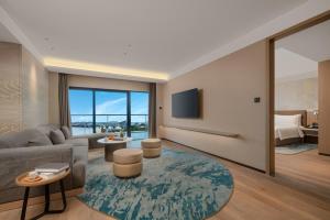 Μια τηλεόραση ή/και κέντρο ψυχαγωγίας στο Holiday Inn Quzhou by IHG